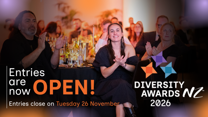 People sitting at a table at an awards event