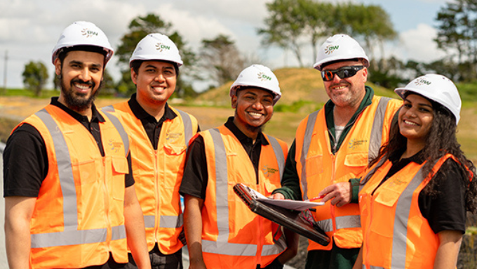 Dempsey Wood Civil Limited group photo all smiling at the camera and in hivis 