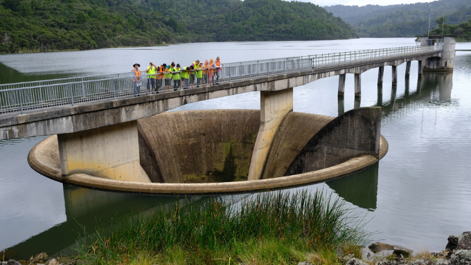 water care team showing others a water overflow design in NZ