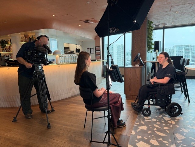 Zoe giving interview at Hind Management